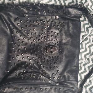 Very large black studs & skulls bag